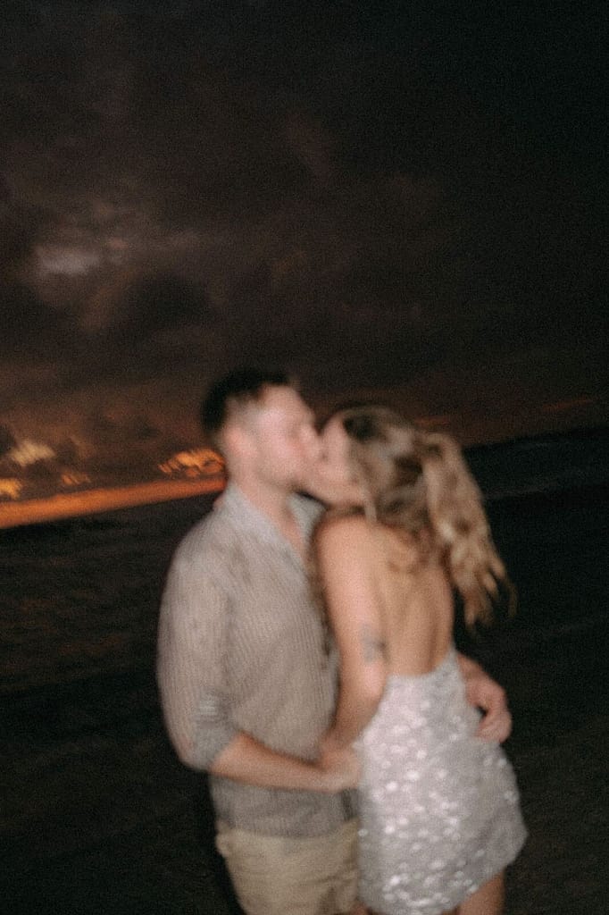 Couple kissing on the beach after dark during a wedding at Hotel Nantipa, Santa Teresa, Costa Rica